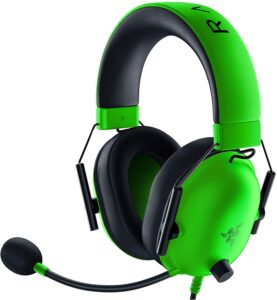 a green and black headphones with a microphone